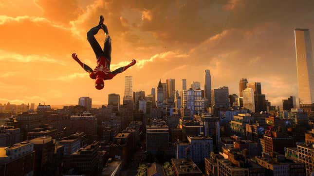 Spider-Man hangs upside down above New York City.