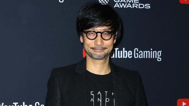 A photo shows Hideo Kojima at an awards show.